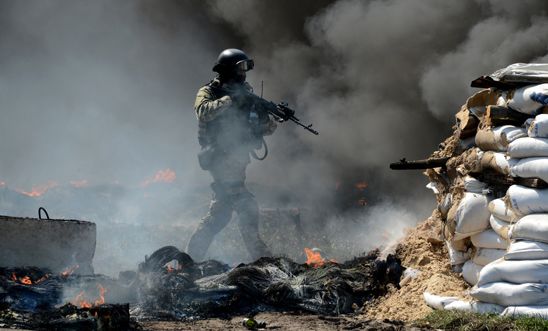 A member of the Ukrainian special forces at an abandoned roadblock in Slavyansk