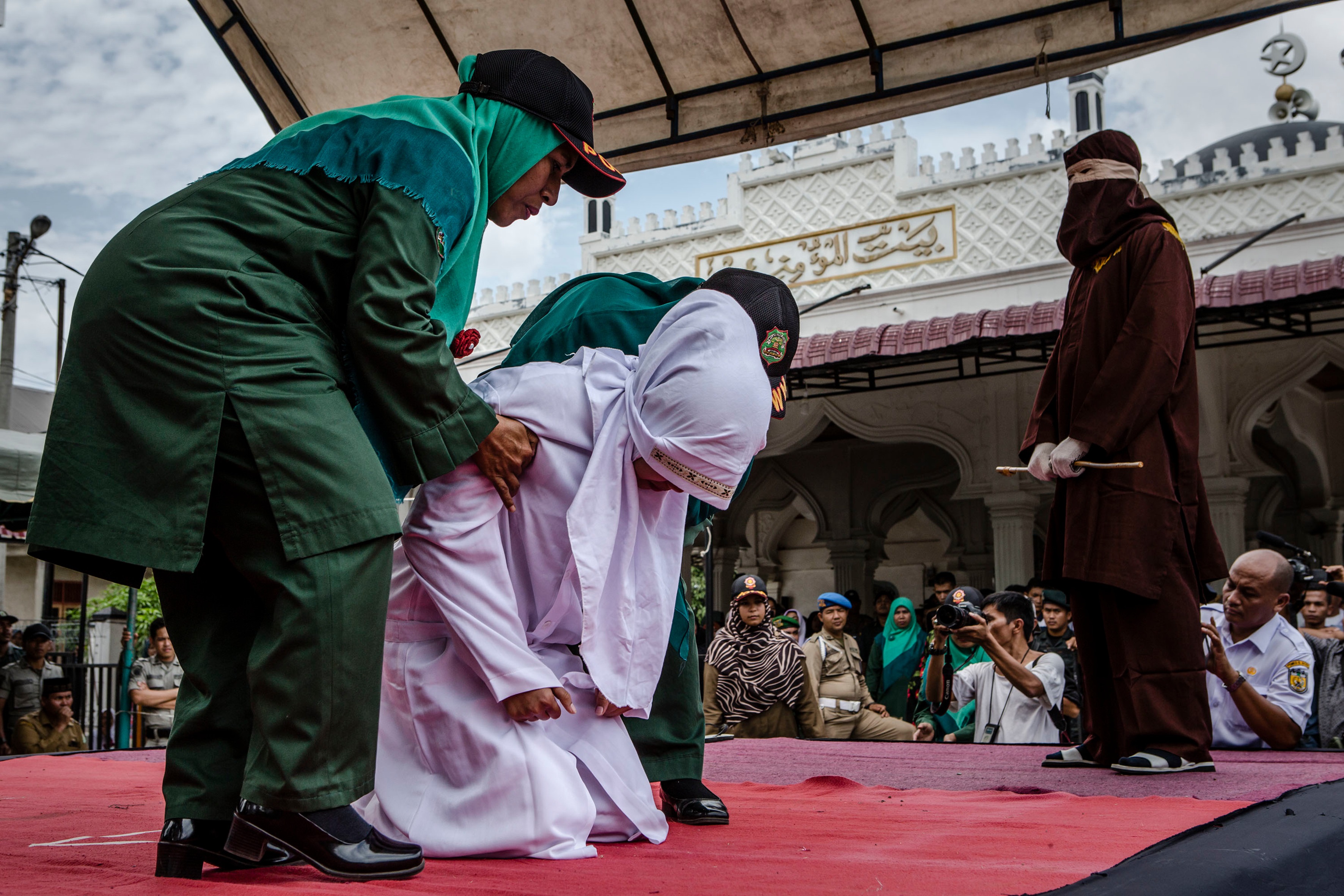 Indonesia Unmarried Couples Caned For Public Affection In An Act Of Utmost Cruelty