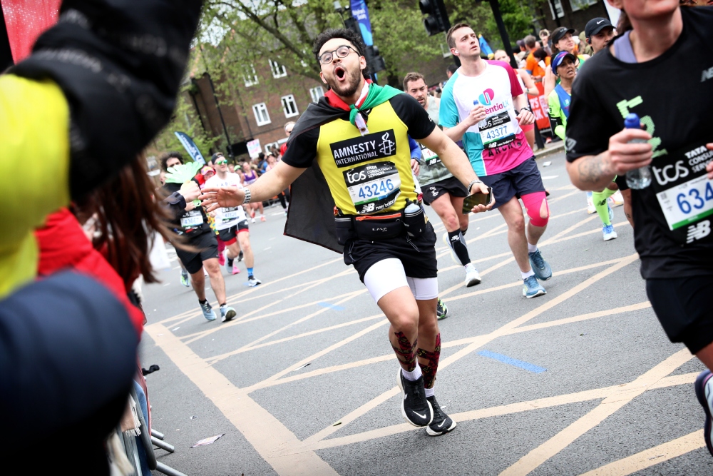 Team Amnesty runner running during London Marathon 2024