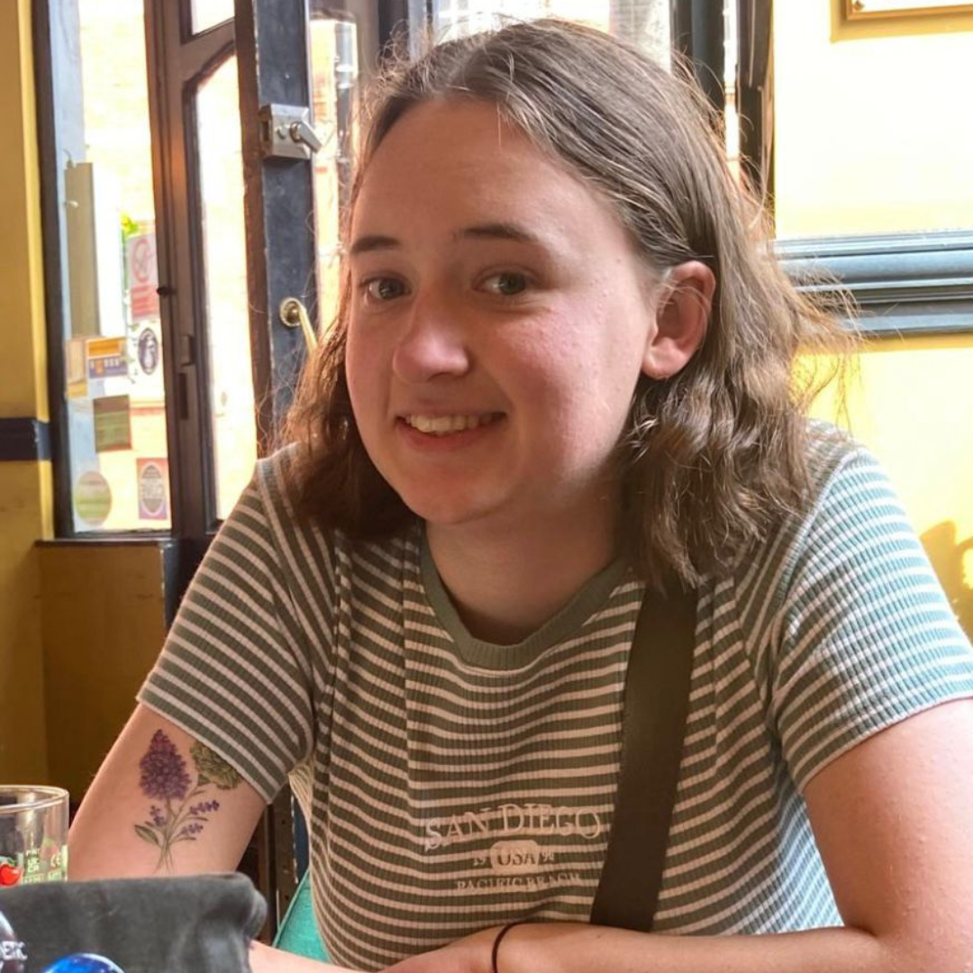 Smiling woman wearing striped top