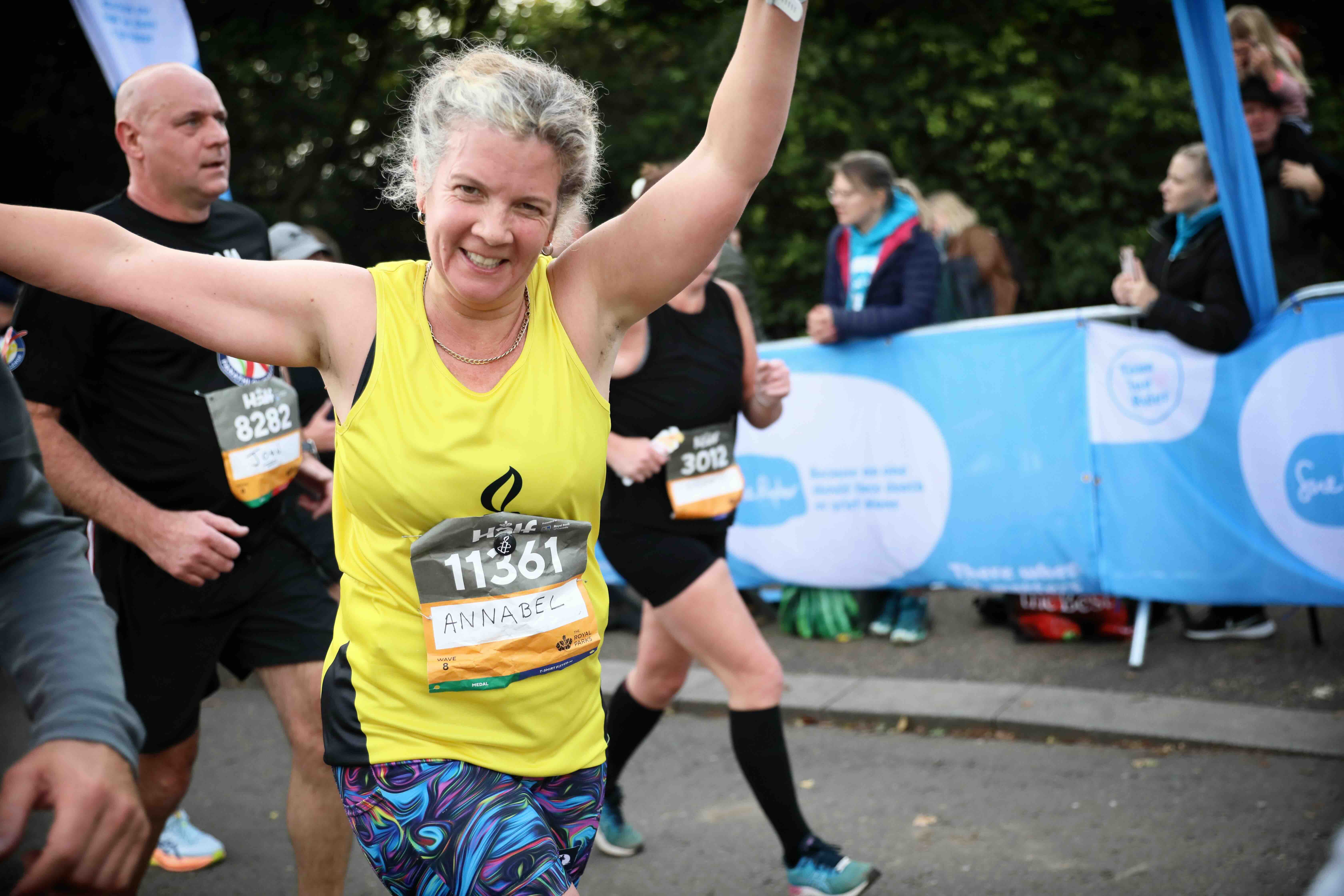 Amnesty runner looking towards camera during a race