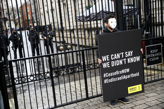 AI UK staged a silent vigil in solidarity with civilians in Rafah outside Downing Street, 14 February 2024, London, UK