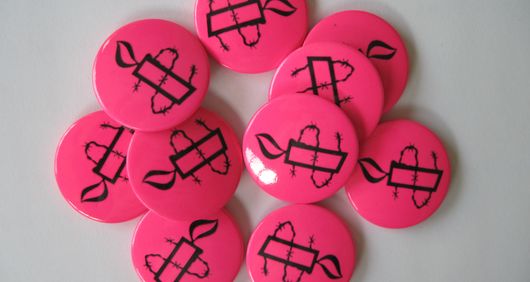 Amnesty Candle Pin Badges Pink (Bag of 10) | Amnesty International UK