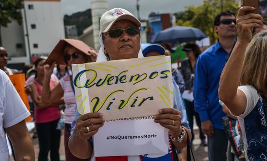 "We want to live" - woman protesting in Venezuela