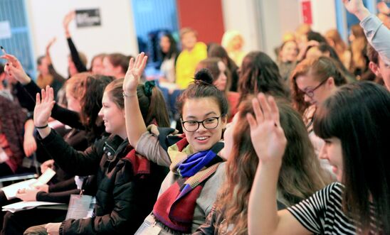 Image of student Amnesty supporters voting at the Student Conference.