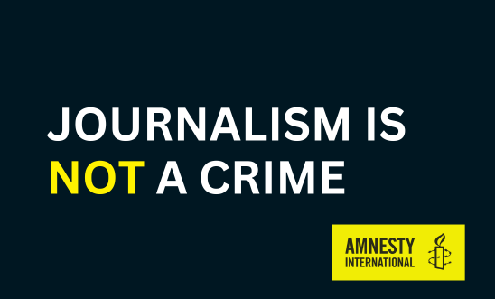 "Journalism is not a crime" banner