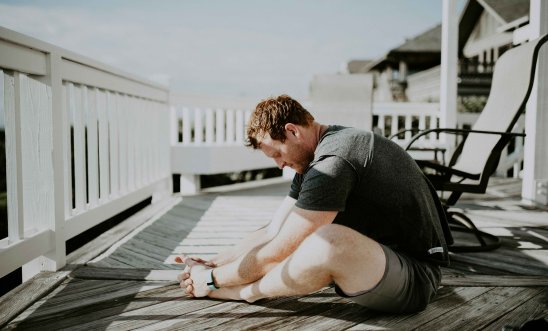 Image shows person stretching after exercising