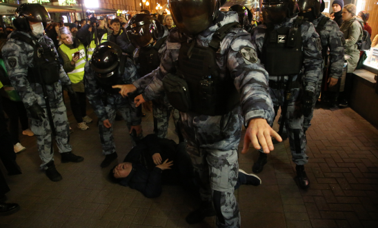 Russia Police officers, one of them with letter "Z" on his uniform, a symbol of support of the military invasion in Ukraine, detains a protester during an unsanctioned1 anti-war protest rally at Arbat street, on September 21, 2022, in Moscow, Russia. More than 500 people in Russian cities were detained during protest rallies against the mobilization for war against Ukraine, announced by President Putin on Wednesday.