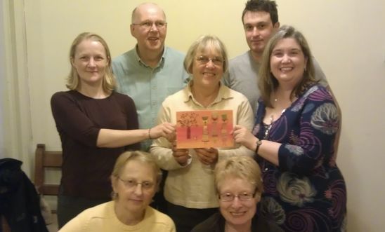 Amnesty Chelmsford sign a birthday card for Mehman Huseynov